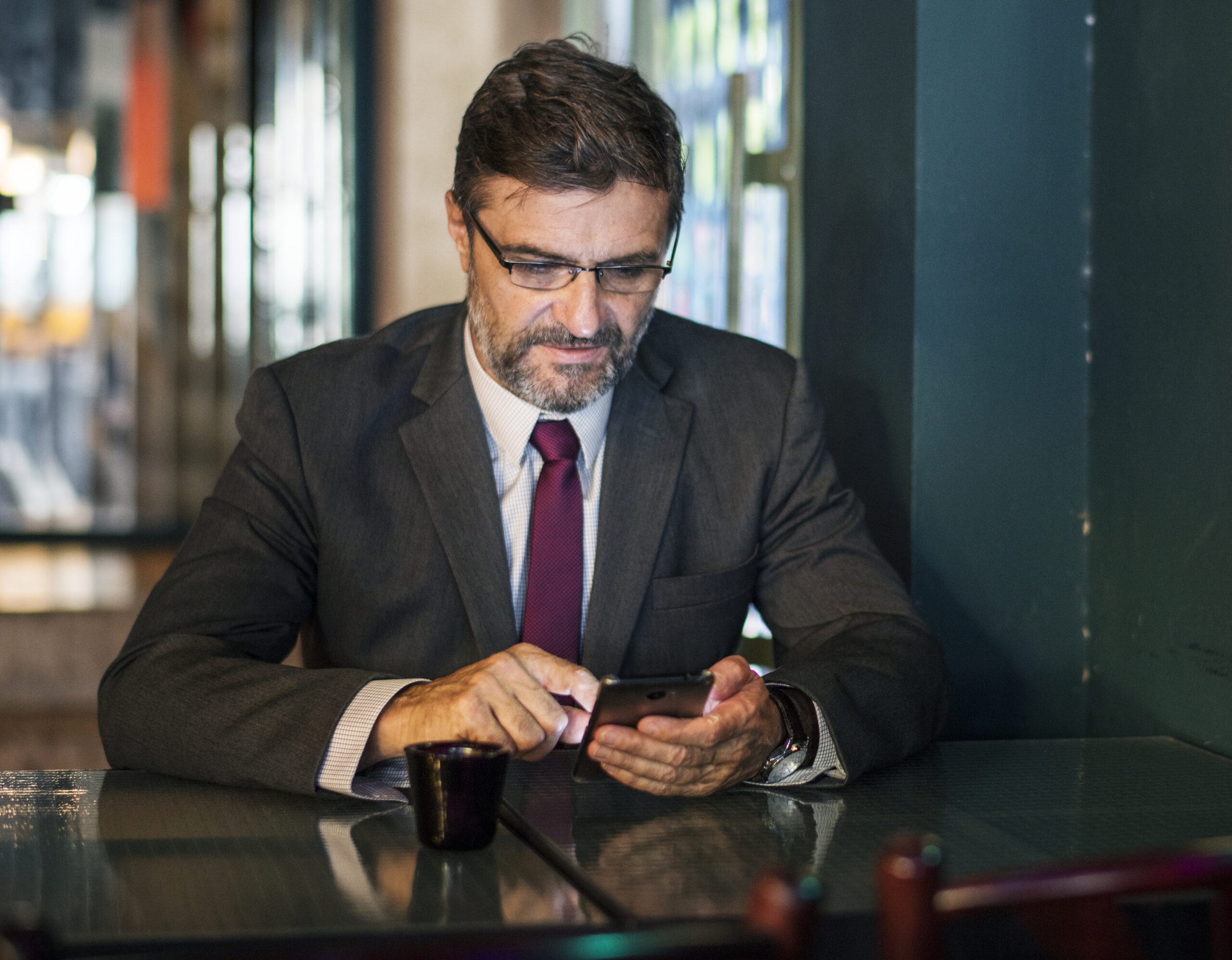 Man checking text messages that may be used as court evidence.