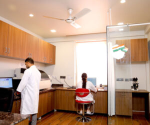 Pathology laboratory at Health Quest Imaging & Diagnostics with trained lab professionals performing diagnostic testing using advanced laboratory equipment in a modern workspace.